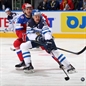 MINSK, BELARUS - MAY 11: Finland's Olli Jokinen #12 reaches for the puck while Russia's Nikolai Kulyomin #41 defends during preliminary round action at the 2014 IIHF Ice Hockey World Championship. (Photo by Andre Ringuette/HHOF-IIHF Images)